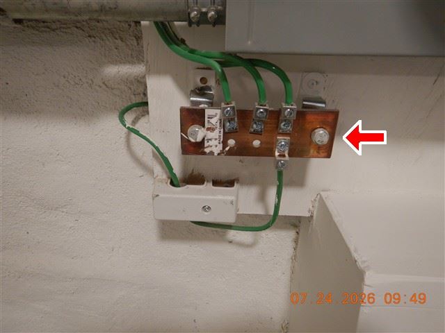 Inspection photograph of a grounding and bonding block with conductors landed