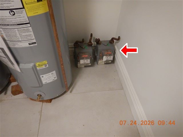 The water heater and its gas control - age, venting and the relief discharge all checked here.
