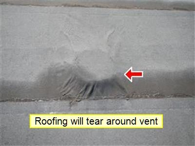 Flat roof membrane with a raised bump where a vent has been covered over, a red arrow and the label roofing will tear around vent.