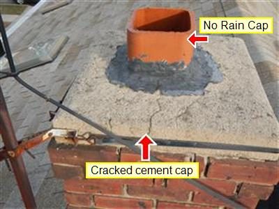 Brick chimney top with a cracked cement cap and open clay flue, labelled 'No Rain Cap' and 'Cracked cement cap'.