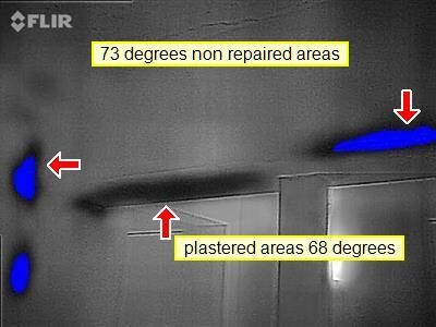 FLIR thermal image of a wall with blue cold spots, labelled 73 degrees non repaired areas and plastered areas 68 degrees.