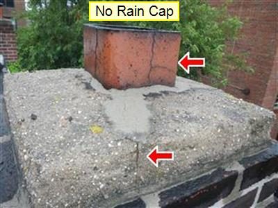 Cement chimney cap with a crack running across it and a cracked ceramic flue tile; report label reads No Rain Cap.