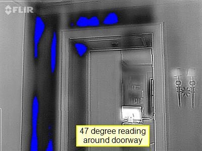 Infrared image of an office doorway with blue cold spots along the frame and a label reading 47 degree reading around doorway.