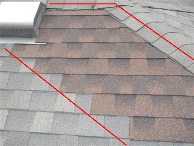 Architectural shingle roof with a strip of newer brown shingles between grey shingles, outlined with red lines, next to a roof vent.