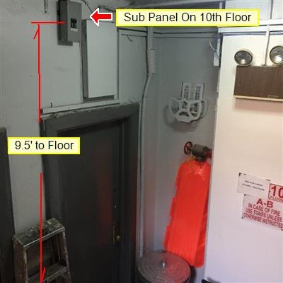 A hallway utility area with a sub-panel labelled as being on the 10th floor, with a measurement annotation.
