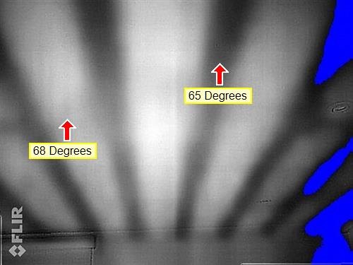 Thermal camera image of a ceiling with dark bands, labels reading 65 and 68 degrees